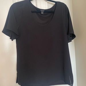 Black short-sleeve blouse.